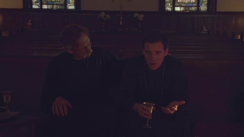 Daniel Steere and Gregory James Cohan in The VelociPastor (2018)