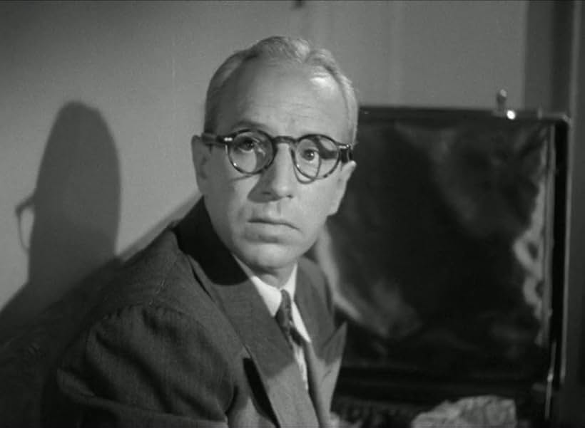 Lloyd Nolan in Two Smart People (1946)