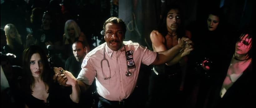 Ving Rhames, Charis Michelsen, and Marshall Dancing Elk Lucas in Bringing Out the Dead (1999)