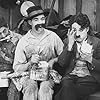 Charles Chaplin, Albert Austin, and Leo White in Behind the Screen (1916)