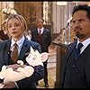 Michael Peña and Chloë Grace Moretz in Tom and Jerry (2021)