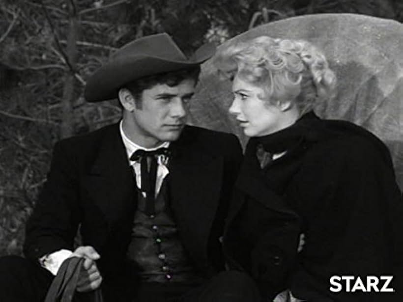 Robert Fuller and Ruta Lee in Wagon Train (1957)