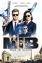 Liam Neeson, Emma Thompson, Tim Blaney, Chris Hemsworth, Tessa Thompson, and Kumail Nanjiani in Men in Black: International (2019)