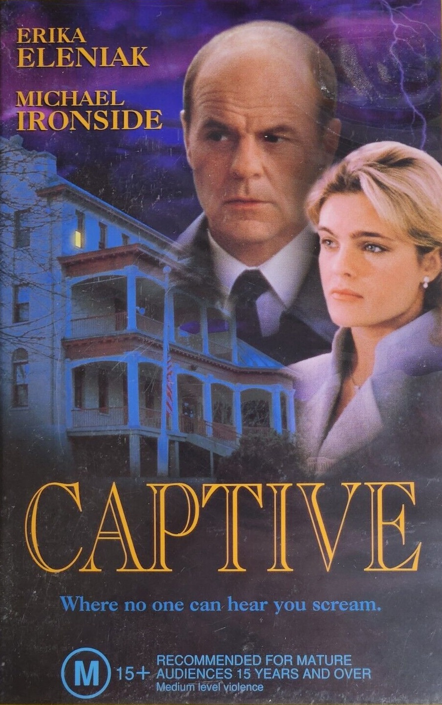 Erika Eleniak and Michael Ironside in Captive (1998)