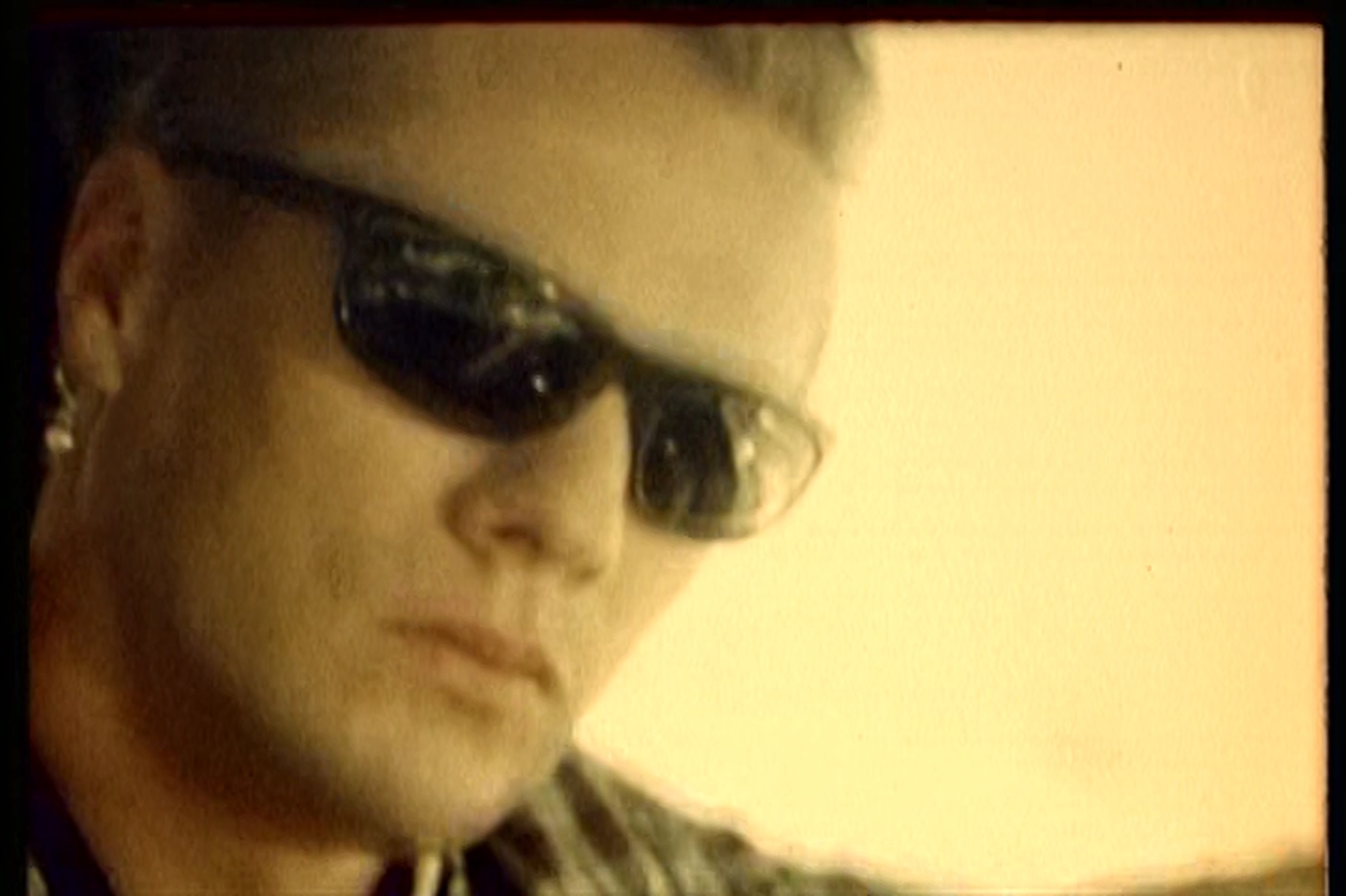 Larry Mullen Jr. and U2 in U2: The Best of 1990-2000 (2002)