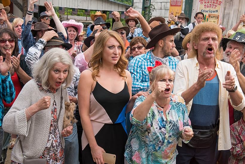 Claire Nadeau, Isabelle Nanty, Jean-Paul Rouve, and Sarah Stern in The Tuche Family: The American Dream (2016)