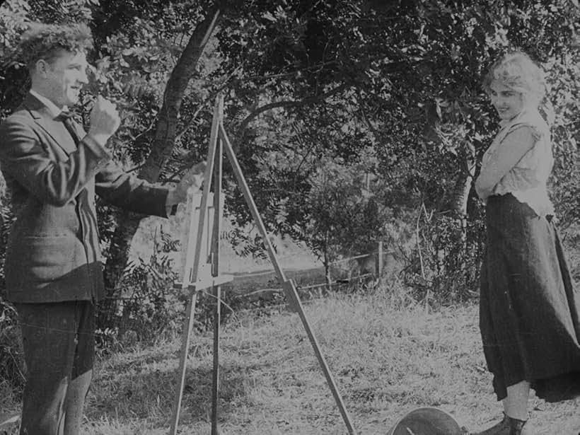 Lloyd Bacon and Edna Purviance in The Vagabond (1916)