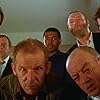 Timothy Spall, Noel Clarke, Christopher Fairbank, Tim Healy, Jimmy Nail, Pat Roach, and Kevin Whately in Auf Wiedersehen, Pet (1983)