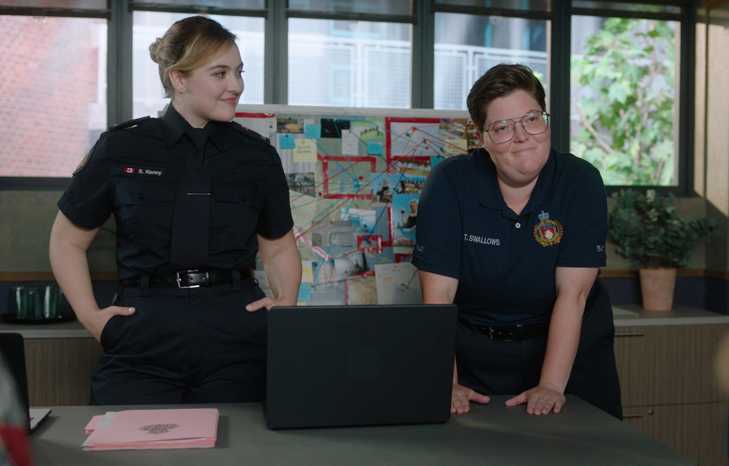 Emily Stranges as Officer Susan Kenny in Pretty Hard Cases Season 3, Episode 8.