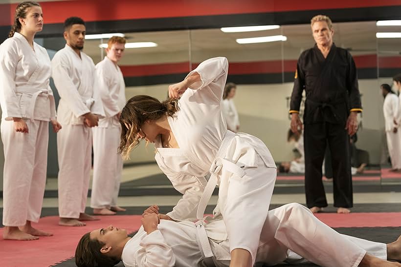 Martin Kove, Peyton List, and Tanner Buchanan in Cobra Kai (2018)