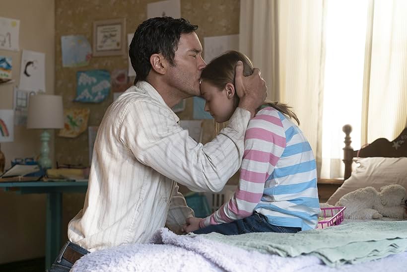 Tom Pelphrey and Olive Abercrombie in Outer Range (2022)