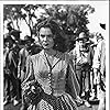 Walter Brennan, Joanne Dru, Dan White, and Chief Yowlachie in Red River (1948)