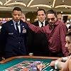 Robert Downey Jr., Terrence Howard, and Jon Favreau in Iron Man (2008)