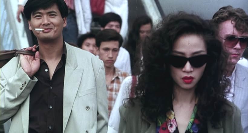 Chow Yun-Fat and Anita Mui in A Better Tomorrow III: Love and Death in Saigon (1989)