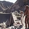 James Franciscus, Curtis Arden, and Laurence Naismith in The Valley of Gwangi (1969)