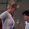 Leslie Easterbrook and Brian Tochi in Police Academy 3: Back in Training (1986)