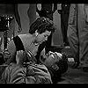 Joaquín Cordero and Norma Suárez in Santo contra cerebro del mal (1961)