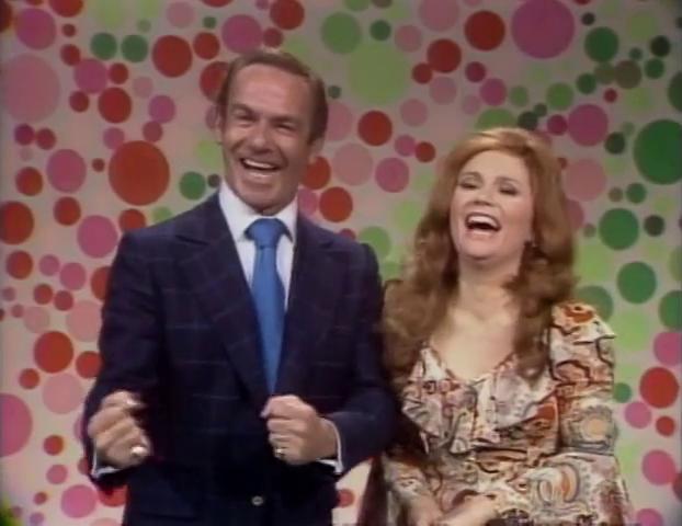 Jack Carter and Barbara Sharma in Rowan & Martin's Laugh-In (1967)