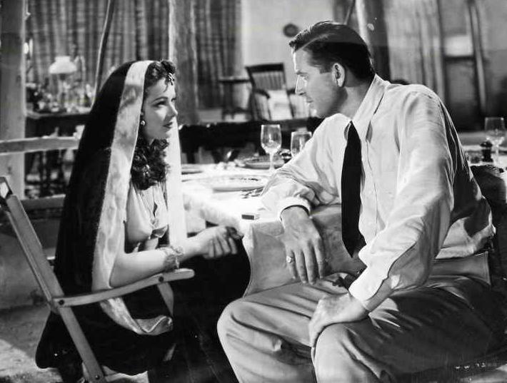 Gene Tierney and Bruce Cabot in Sundown (1941)