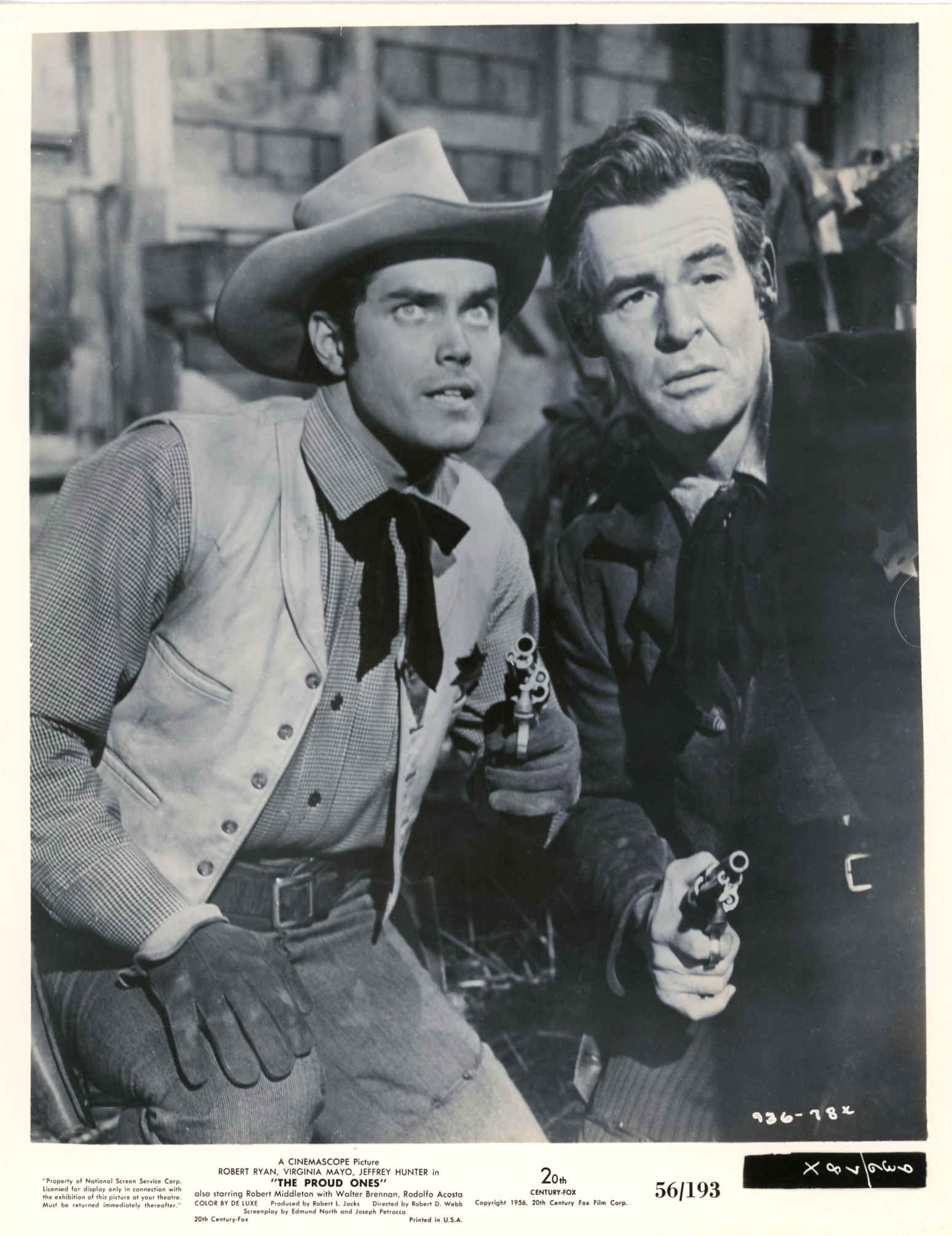 Jeffrey Hunter and Robert Ryan in The Proud Ones (1956)