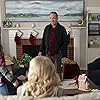 Tim Allen, Elizabeth Mitchell, and Elizabeth Allen-Dick in The Santa Clauses (2022)