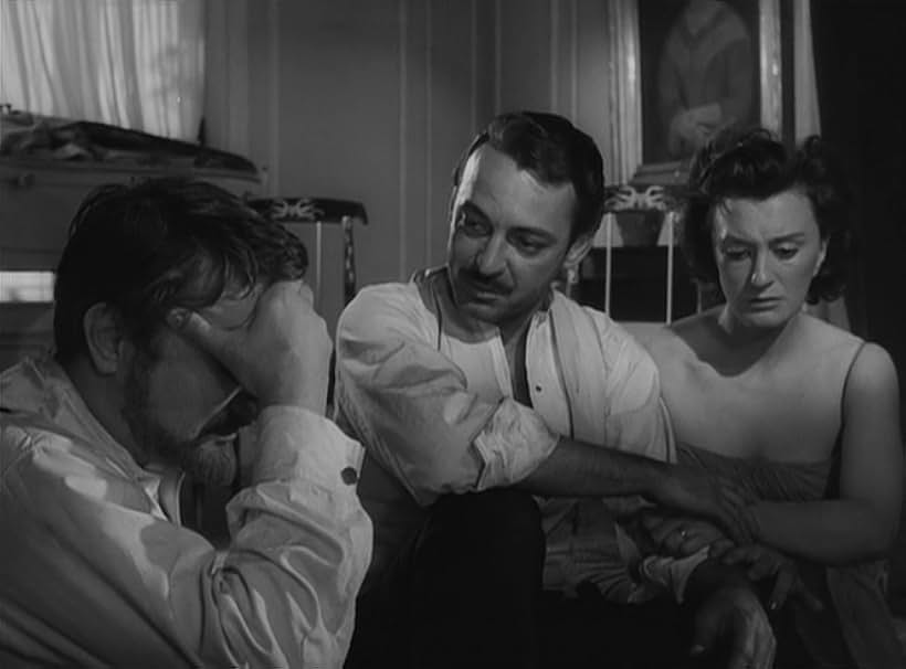 César del Campo, Lucy Gallardo, and Enrique Rambal in The Exterminating Angel (1962)