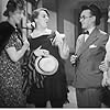 Ernest Butcher, Doris Waters, Elsie Waters, and Jean MacMurray in It's in the Bag (1944)