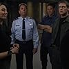 Beau Bridges, Claudia Black, Ben Browder, and Michael Shanks in Stargate SG-1 (1997)