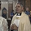 Rowan Atkinson and Lily James in One Red Nose Day and a Wedding (2019)