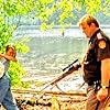 Bridget Fonda, Bill Pullman, and Brendan Gleeson in Lake Placid (1999)