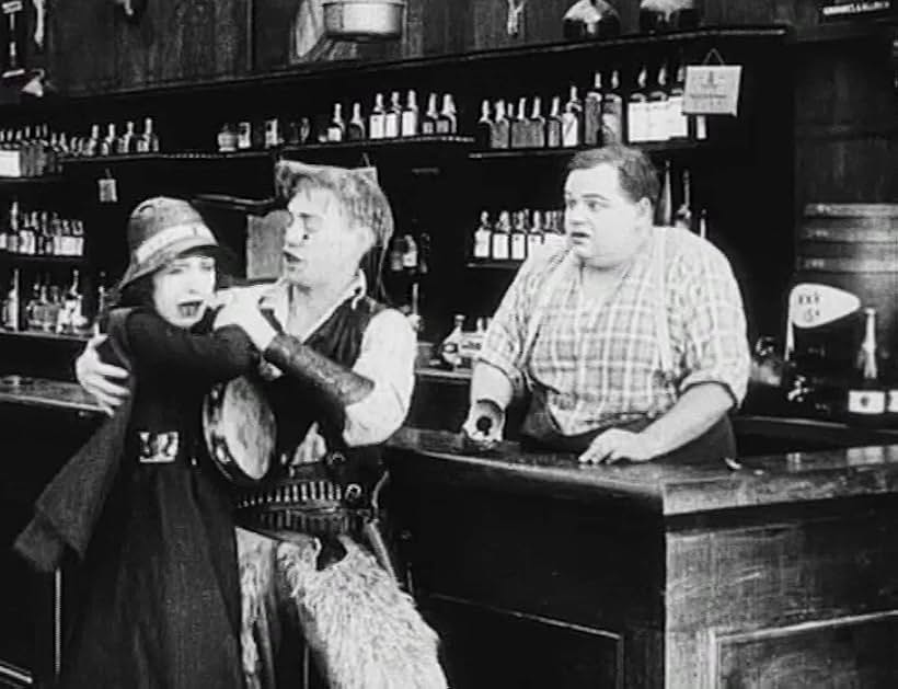 Roscoe 'Fatty' Arbuckle, Alice Lake, and Al St. John in Out West (1918)