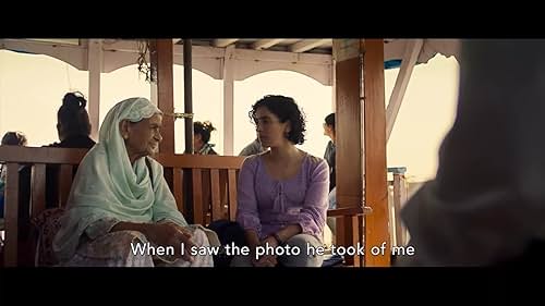 A struggling street photographer in Mumbai, pressured to marry by his grandmother, convinces a shy stranger to pose as his fiancée. The pair develop a connection that transforms them in ways they could not expect.