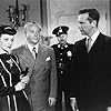 Steven Geray, Dick Powell, and Nina Vale in Cornered (1945)