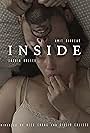 Saskia Muller and Amit Divekar in Inside (2022)