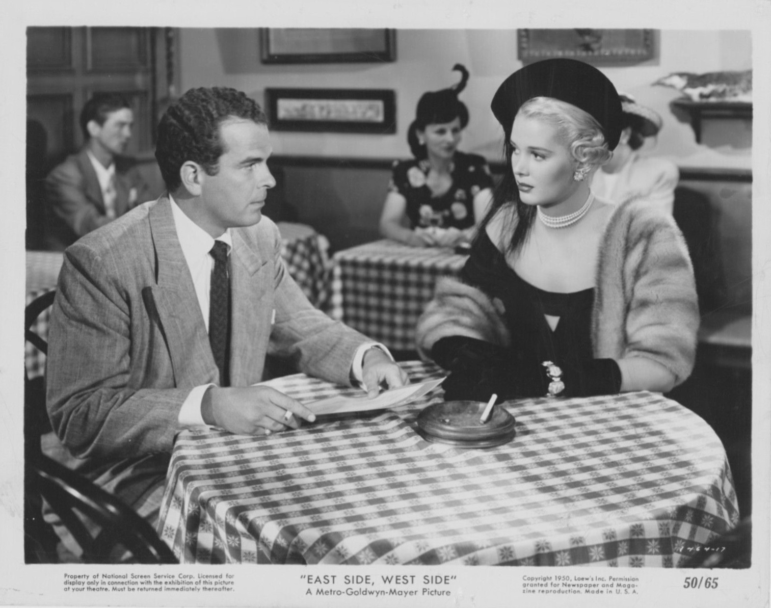 Douglas Kennedy and Beverly Michaels in East Side, West Side (1949)