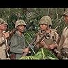 Frank Sinatra, Tony Bill, Tommy Sands, and Clint Walker in None But the Brave (1965)