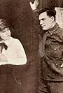 Ethel Clayton and Rockliffe Fellowes in The Man Hunt (1918)