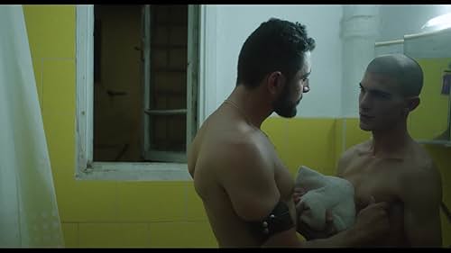 Yonatan abandons the army in an attempt to reunite with his ex-boyfriend. But after being rejected, he finds himself alone in Tel Aviv, without a place to sleep. Broken and confused, he heads into the night looking for consolation. On a hook-up app he meets a 40-year-old man named Sam who invites him to come over. Upon arrival, Yonatan finds himself in the midst of a party - an uninhibited wonderland filled with strange men. The night unfolds through urges of self destruction and desperation. But all Yonatan wants is a warm human embrace. And so begins the journey of an 18 year old boy who's looking for home.
www.nqvmedia.com