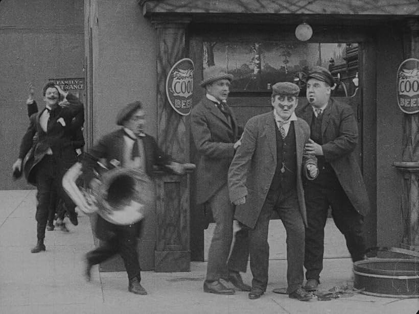 Albert Austin, Frank J. Coleman, Fred Goodwins, and John Rand in The Vagabond (1916)