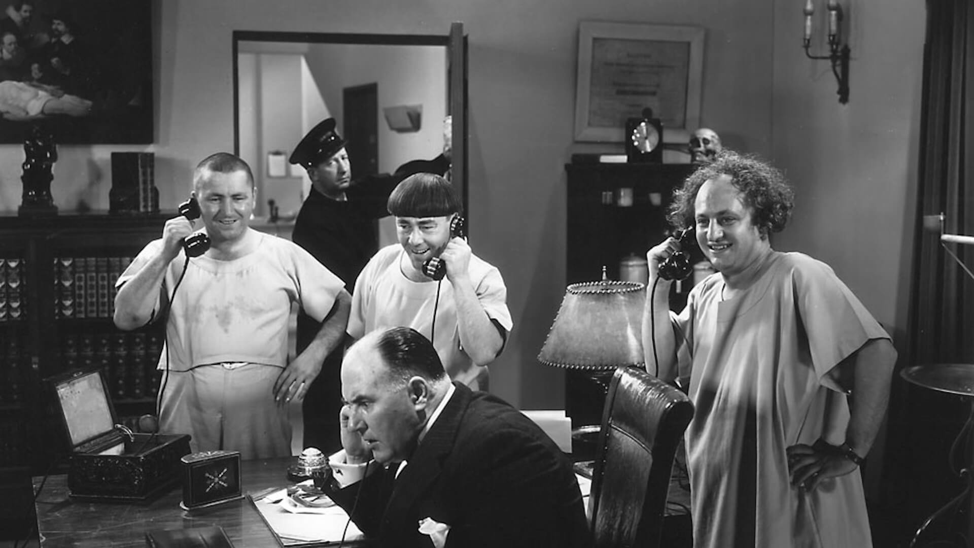 Moe Howard, Larry Fine, Bob Callahan, Dell Henderson, and Curly Howard in Men in Black (1934)