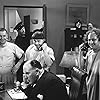 Moe Howard, Larry Fine, Bob Callahan, Dell Henderson, and Curly Howard in Men in Black (1934)