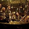 Johnny Depp, Lee Arenberg, Orlando Bloom, Mackenzie Crook, Naomie Harris, and Kevin McNally in Pirates of the Caribbean: Dead Man's Chest (2006)