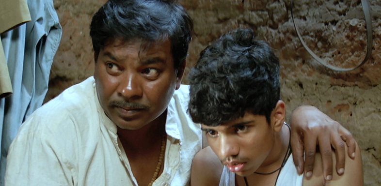 Kishore Kadam and Madan Deodhar in Ek Cup Chya (2009)