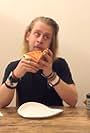 Macaulay Culkin in Macaulay Culkin Eating a Slice of Pizza (2013)