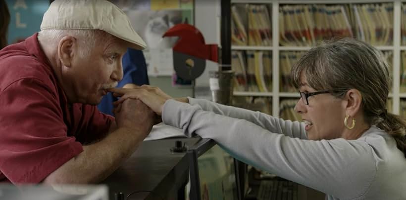 The receptionist (Paula Spurr) getting some attention from the patient (Richard Dreyfuss) in episode 5 of "Hit The Road".