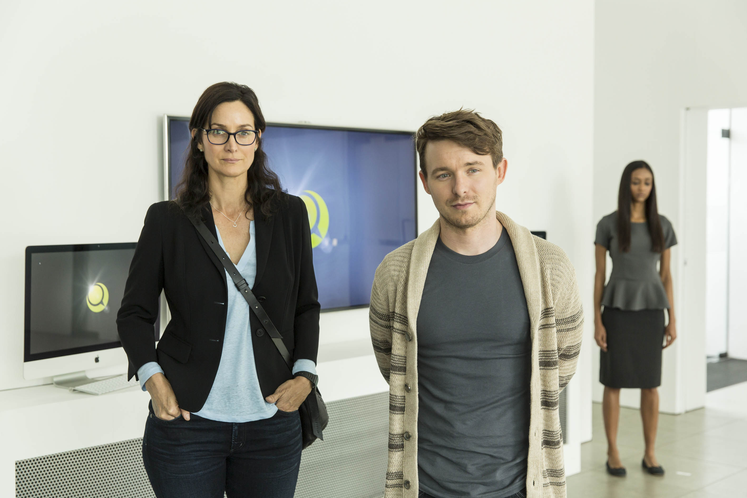 Carrie-Anne Moss and Marshall Allman in Humans (2015)