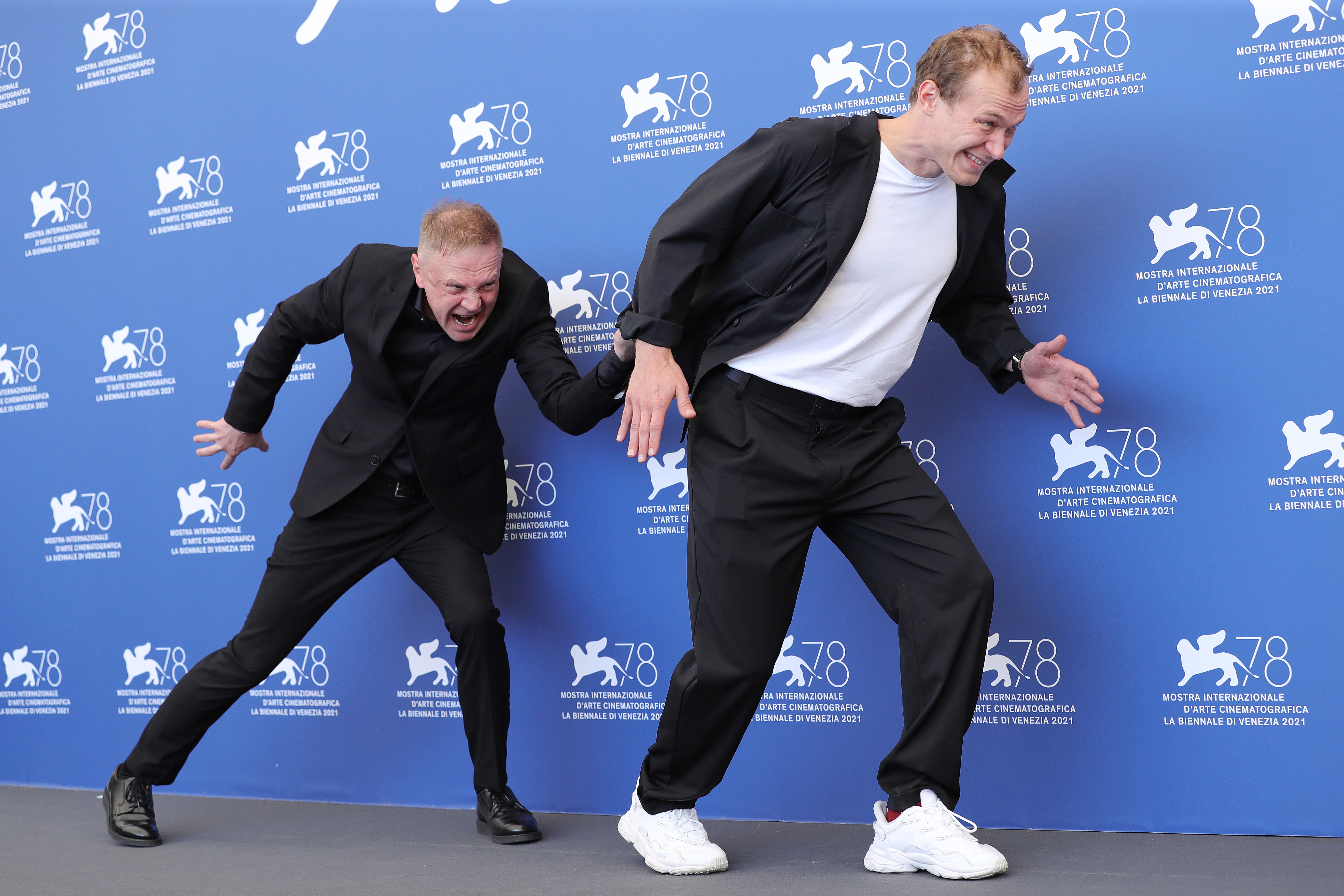 Timofey Tribuntsev and Yura Borisov at an event for Captain Volkonogov Escaped (2021)