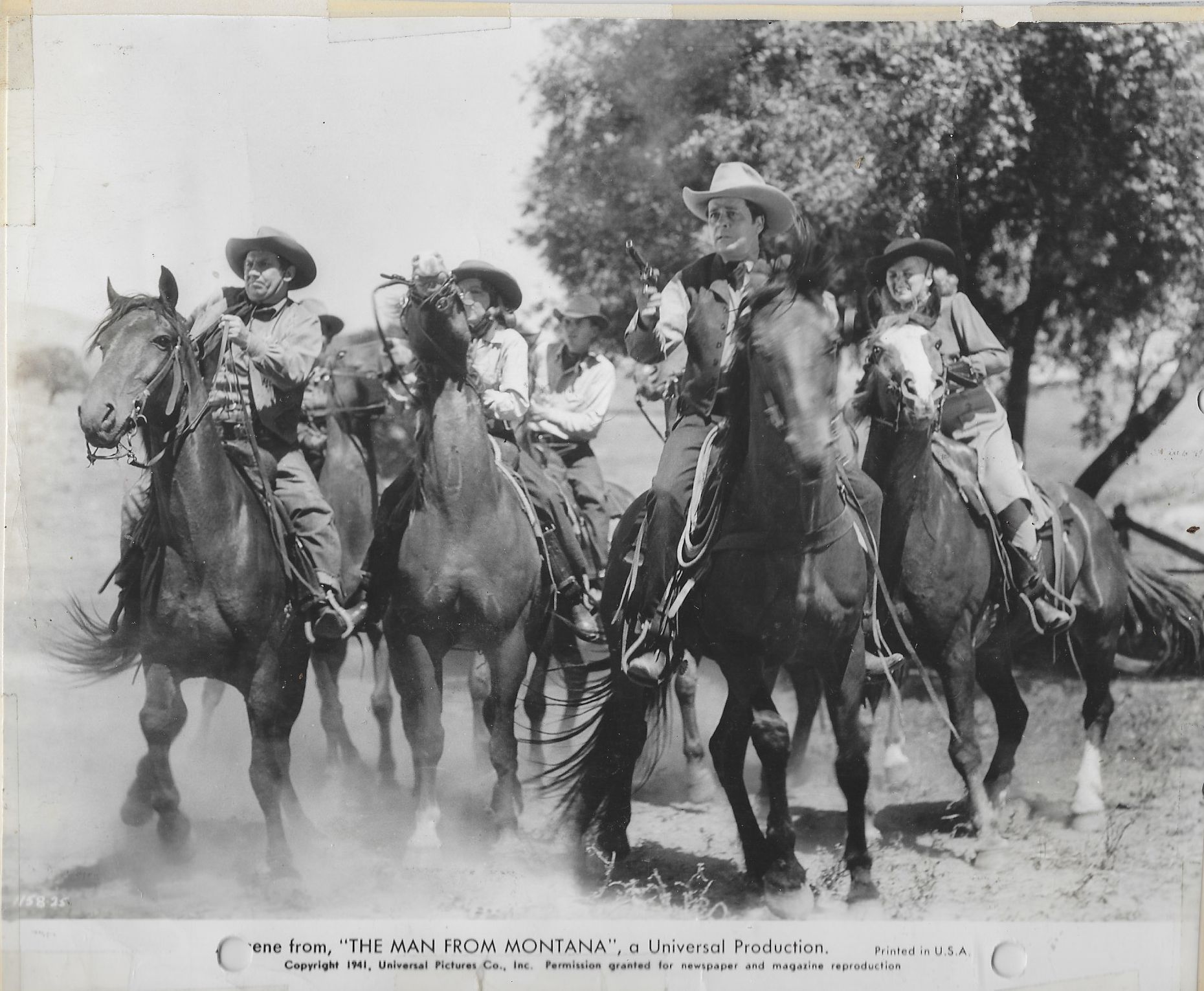 Jean Brooks, Edmund Cobb, Fuzzy Knight, Nell O'Day, and Henry Wills in Man from Montana (1941)