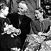 Bette Davis, Marlene Burnett, and Donald Crisp in The Old Maid (1939)