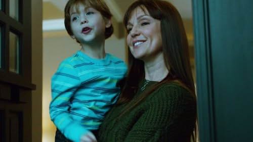 Sarah-Jane Redmond and Jacob Tremblay in Motive (2013)